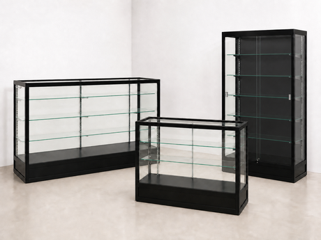 Radius Edge retail showcases and wallcase with black interior back arranged in a bright showroom