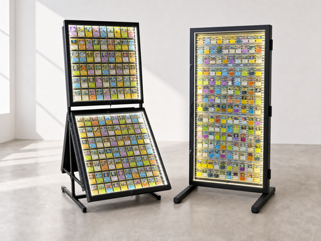 H012B and H006B illuminated displays filled with Pokémon cards in a white showroom